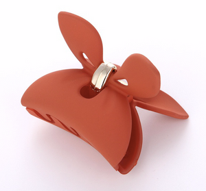 Roxy bow orange clip